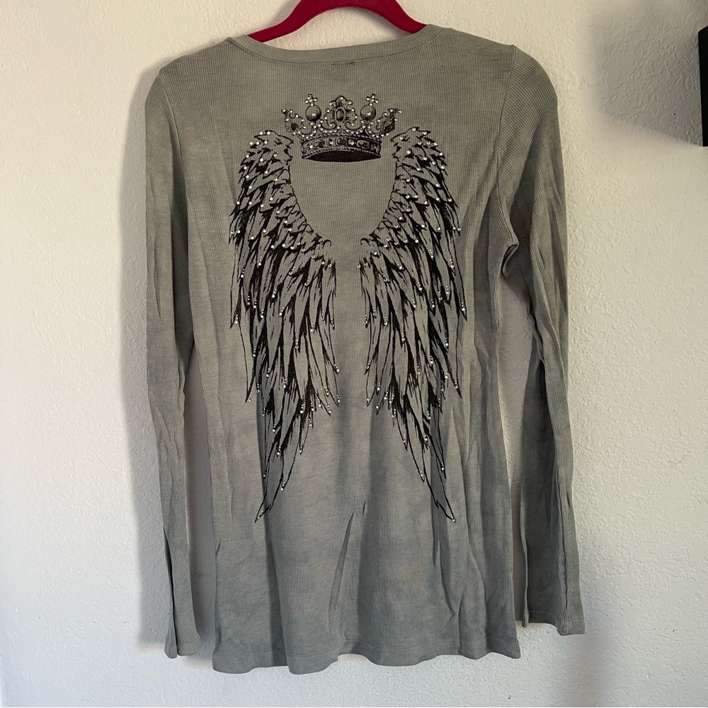 (A) medium grey long sleeve wings detail top
